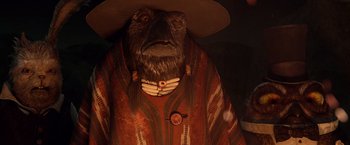 Movie still from “Rango” (2011), directed by Gore Verbinski – A statue of a man with a beard and a hat on; Close Up shot, Low angle