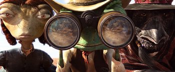 Movie still from “Rango” (2011), directed by Gore Verbinski – The eyes of a frog wearing a pair of binoculars; Extreme Close Up shot, Over the shoulder angle