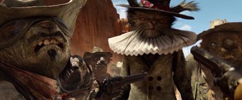 Movie still from “Rango” (2011), directed by Gore Verbinski – An image of a cat wearing a hat and holding a gun; Close Up shot, Low angle