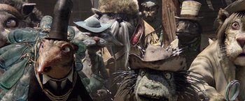 Movie still from “Rango” (2011), directed by Gore Verbinski – A group of people dressed up like cats; Close Up shot, Low angle