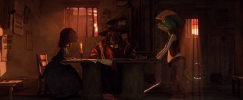 Movie still from “Rango” (2011), directed by Gore Verbinski – A group of people sitting at a table with a candle; Wide shot, Low angle