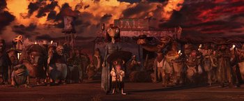 Movie still from “Rango” (2011), directed by Gore Verbinski – An image of an animated movie scene with a woman and a child; Wide shot, Low angle