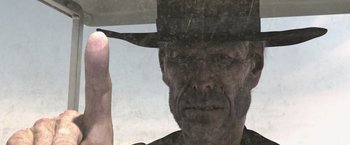 Movie still from “Rango” (2011), directed by Gore Verbinski – A man in a cowboy hat is looking at the camera; Close Up shot, Low angle