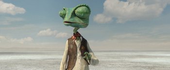 Movie still from “Rango” (2011), directed by Gore Verbinski – An animated lizard wearing a suit and tie; Close Up shot, Low angle