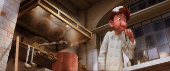Movie still from “Ratatouille” (2007), directed by Jan Pinkava – An animated character is in a kitchen with an oven behind him; Medium shot, Low angle