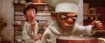 Movie still from “Ratatouille” (2007), directed by Jan Pinkava – An animated character and a chef in a kitchen; Close Up shot, Low angle