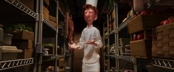 Movie still from “Ratatouille” (2007), directed by Jan Pinkava – An animated character in a white chef's outfit in a kitchen; Medium shot, Low angle