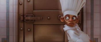 Movie still from “Ratatouille” (2007), directed by Jan Pinkava – An animated character with an evil look on his face; Close Up shot, High angle