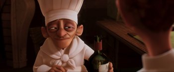 Movie still from “Ratatouille” (2007), directed by Jan Pinkava – An animated chef holding a bottle of wine; Close Up shot, Over the shoulder angle