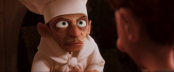 Movie still from “Ratatouille” (2007), directed by Jan Pinkava – An animated character looking at a person; Close Up shot, Over the shoulder angle