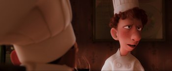 Movie still from “Ratatouille” (2007), directed by Jan Pinkava – Two people are sitting in front of a wine glass; Close Up shot, Over the shoulder angle