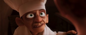 Movie still from “Ratatouille” (2007), directed by Jan Pinkava – An animated character with green eyes wearing a chef's hat; Close Up shot, Low angle
