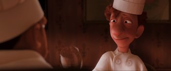 Movie still from “Ratatouille” (2007), directed by Jan Pinkava – An image of an animated character in a restaurant setting; Close Up shot, Low angle