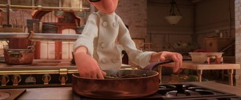 Movie still from “Ratatouille” (2007), directed by Jan Pinkava – An animated character is cooking in a kitchen; Close Up shot, Over the shoulder angle