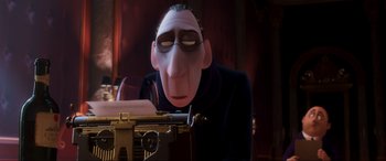 Movie still from “Ratatouille” (2007), directed by Jan Pinkava – A man with glasses is looking down at a typewriter; Close Up shot, Over the shoulder angle