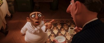 Movie still from “Ratatouille” (2007), directed by Jan Pinkava – An animated character pointing at a person in a room; Medium shot, Over the shoulder angle