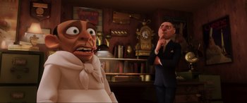 Movie still from “Ratatouille” (2007), directed by Jan Pinkava – A man and a woman are standing in a room with a clock; Medium shot, Low angle