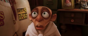Movie still from “Ratatouille” (2007), directed by Jan Pinkava – An animated picture of an elf with green eyes; Close Up shot, High angle