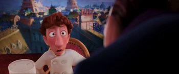 Movie still from “Ratatouille” (2007), directed by Jan Pinkava – An animated scene of a man looking surprised at another man; Medium shot, Over the shoulder angle