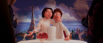 Movie still from “Ratatouille” (2007), directed by Jan Pinkava – A couple of people that are in front of a cake; Medium shot, Low angle