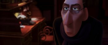 Movie still from “Ratatouille” (2007), directed by Jan Pinkava – An animated man with glasses is looking at the camera; Close Up shot, Over the shoulder angle