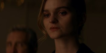 Movie still from “Ray Donovan: The Movie” (2022), directed by David Hollander – A person with long hair; Close Up shot, Low angle