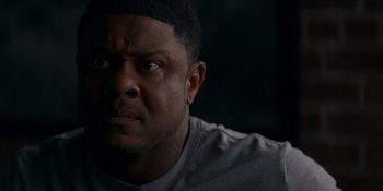 Movie still from “Ray Donovan: The Movie” (2022), directed by David Hollander – A person with his eyes wide open; Close Up shot, Low angle