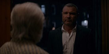 Movie still from “Ray Donovan: The Movie” (2022), directed by David Hollander – A man and a woman are looking at each other; Close Up shot, Over the shoulder angle