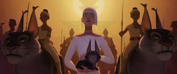 Movie still from “Raya and the Last Dragon” (2021), directed by Don Hall – An illustration of a woman holding an egyptian cat; Medium shot, Low angle