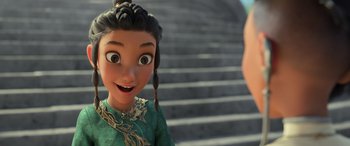 Movie still from “Raya and the Last Dragon” (2021), directed by Don Hall – A young girl is smiling for the camera; Close Up shot, Over the shoulder angle