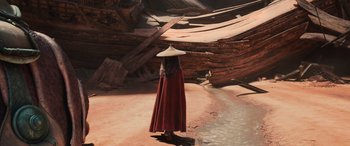 Movie still from “Raya and the Last Dragon” (2021), directed by Don Hall – A woman wearing a hat and a red cape; Extreme Wide shot, High angle