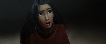 Movie still from “Raya and the Last Dragon” (2021), directed by Don Hall – An animated woman with long black hair looking surprised; Close Up shot, Over the shoulder angle