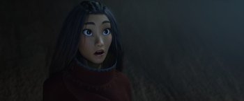 Movie still from “Raya and the Last Dragon” (2021), directed by Don Hall – A woman's face in a dark room; Close Up shot, Over the shoulder angle