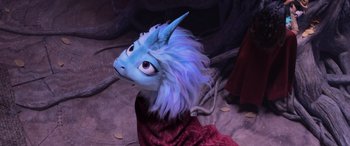 Movie still from “Raya and the Last Dragon” (2021), directed by Don Hall – The head of a blue creature; Close Up shot, High angle