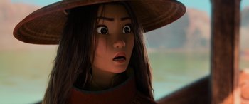 Movie still from “Raya and the Last Dragon” (2021), directed by Don Hall – An animated woman with a surprised look on her face; Close Up shot, Over the shoulder angle