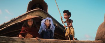 Movie still from “Raya and the Last Dragon” (2021), directed by Don Hall – A group of people on a boat in the water; Medium shot, Low angle