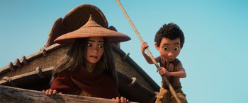 Movie still from “Raya and the Last Dragon” (2021), directed by Don Hall – An asian woman and a young boy are in a boat; Medium shot, Low angle