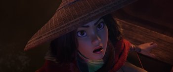 Movie still from “Raya and the Last Dragon” (2021), directed by Don Hall – A person wearing a hat; Close Up shot, High angle