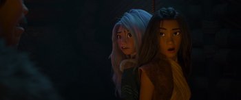 Movie still from “Raya and the Last Dragon” (2021), directed by Don Hall – Two animated girls standing next to each other in the dark; Close Up shot, Over the shoulder angle