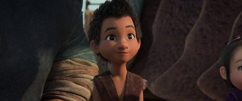 Movie still from “Raya and the Last Dragon” (2021), directed by Don Hall – A young boy is looking at the camera; Medium shot, High angle
