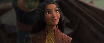 Movie still from “Raya and the Last Dragon” (2021), directed by Don Hall – A young woman's face in a movie scene; Close Up shot, Over the shoulder angle