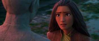 Movie still from “Raya and the Last Dragon” (2021), directed by Don Hall – A person with long brown hair; Close Up shot, Over the shoulder angle