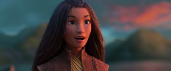 Movie still from “Raya and the Last Dragon” (2021), directed by Don Hall – A person with long black hair; Close Up shot, Over the shoulder angle
