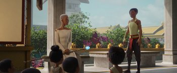 Movie still from “Raya and the Last Dragon” (2021), directed by Don Hall – An animated scene of a woman holding a sword in front of a group of people; Medium shot, Over the shoulder angle