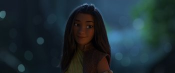Movie still from “Raya and the Last Dragon” (2021), directed by Don Hall – A girl with long brown hair is smiling for the camera; Close Up shot, Over the shoulder angle