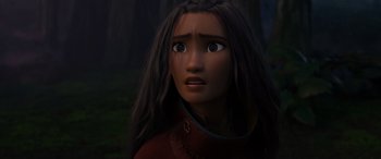 Movie still from “Raya and the Last Dragon” (2021), directed by Don Hall – A person with long black hair; Close Up shot, Over the shoulder angle