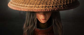 Movie still from “Raya and the Last Dragon” (2021), directed by Don Hall – A person wearing a hat; Close Up shot, Low angle
