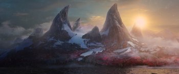 Movie still from “Raya and the Last Dragon” (2021), directed by Don Hall – A painting of mountains and a body of water in the background; Extreme Wide shot, High angle