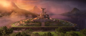 Movie still from “Raya and the Last Dragon” (2021), directed by Don Hall – An image of an image of a statue in the middle of a field; Extreme Wide shot, High angle