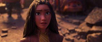 Movie still from “Raya and the Last Dragon” (2021), directed by Don Hall – A person with long brown hair; Close Up shot, Over the shoulder angle